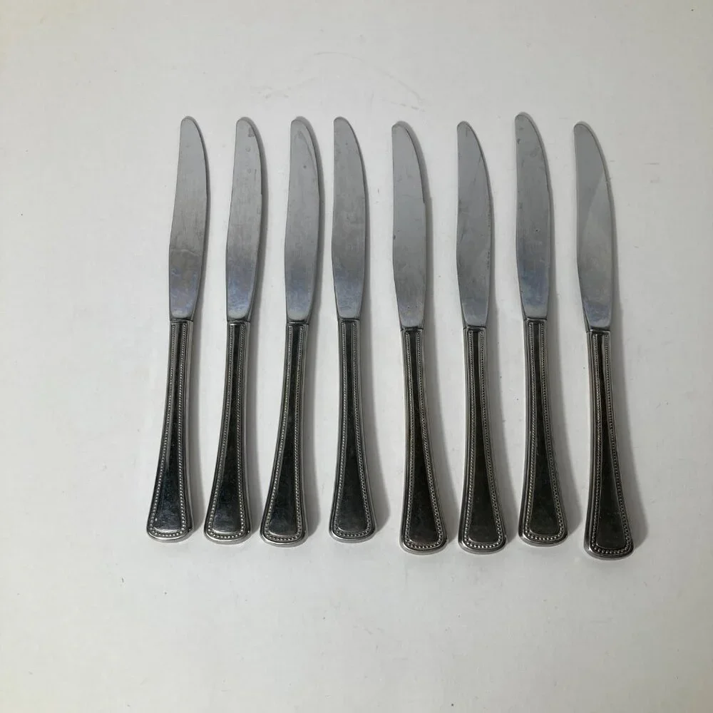 8- Oneida Stainless Flatware Knives 9